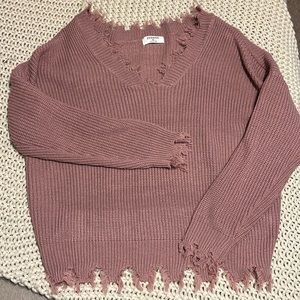 suuuper cute sweater with frayed ends on sleeves and bottom of shirt, & collar!!